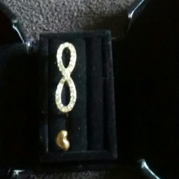 Infinity size 8 ring - Picture 1 of 3